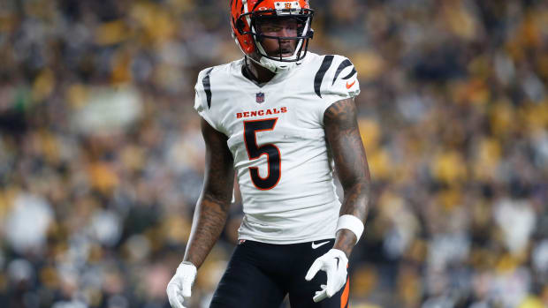 Dec 23, 2023; Pittsburgh, Pennsylvania, USA; Cincinnati Bengals wide receiver Tee Higgins (5) at the line of scrimmage against the Pittsburgh Steelers during the second quarter at Acrisure Stadium. Mandatory Credit: Charles LeClaire-USA TODAY Sports  